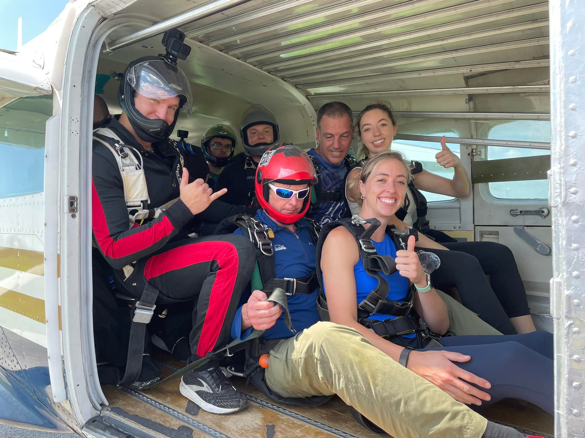 tandem skydiver smiles in freefall